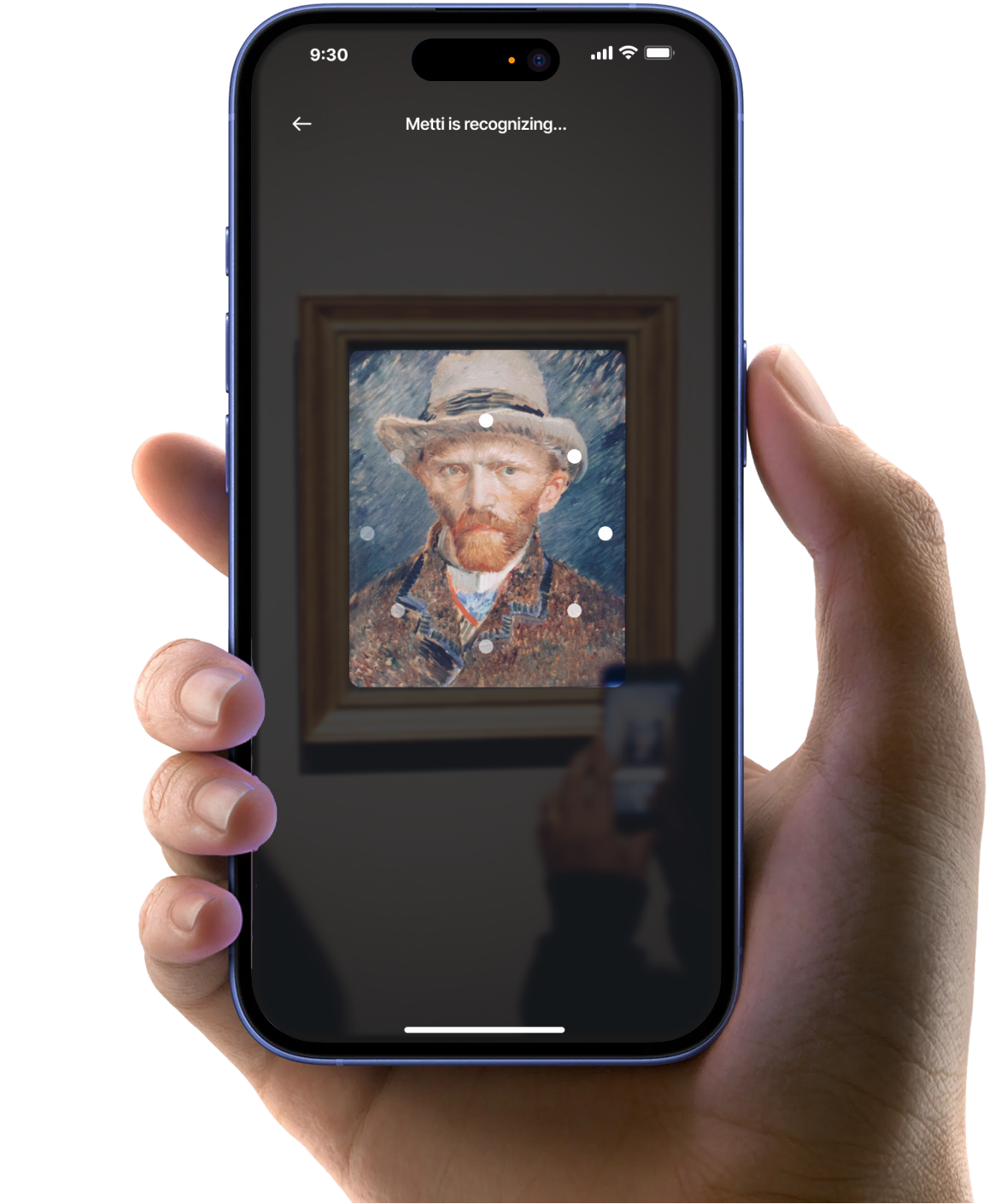 Hand holding phone with artwork recognition screen